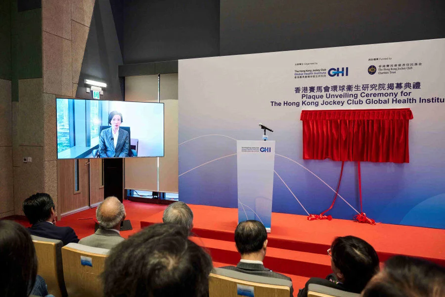 Dr Cecilia Fan, Acting Secretary for Health of the Government of the HKSAR, delivers a speech by video at the plaque- unveiling ceremony of the HKJCGHI.  
