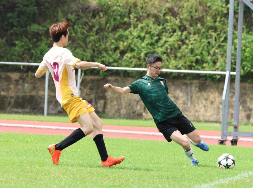 Players from both teams compete hard during the game.