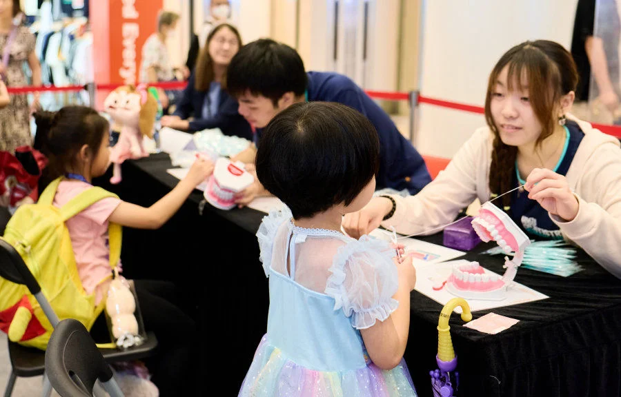 Residents participated in a dental care tutorial and learned the proper techniques for cleaning their teeth.