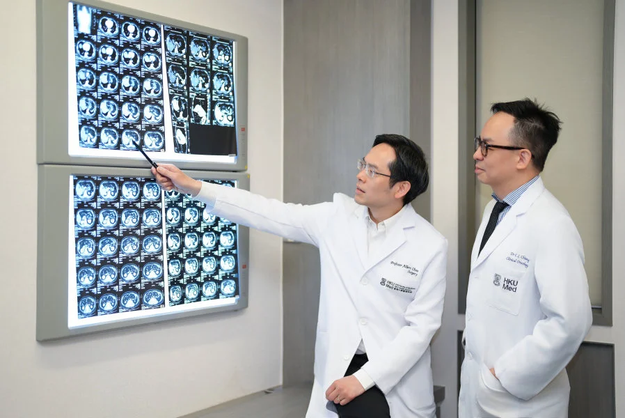 The LRT-IO approach is a potentially curative treatment for large, unresectable liver cancer, with a 46% complete response rate, and a 75% survival rate among patients who achieved a complete response. The photo shows Professor Albert Chan Chi-yan (left) and Dr Chiang Chi-leung.  