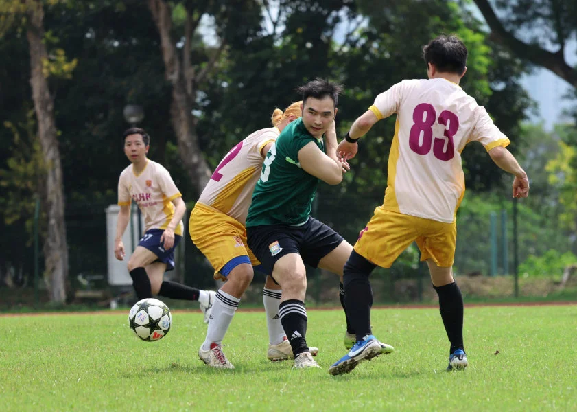 Players from both teams compete hard during the game.