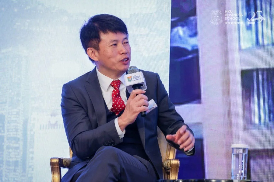Prof. Hongbin Cai, Dean and Chair of Economics of HKU Business School, moderating the panel.