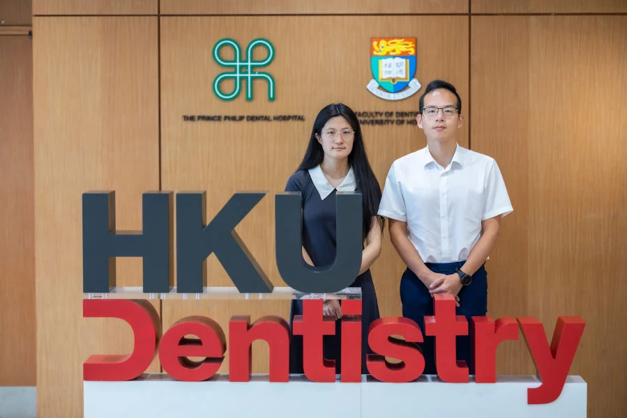 (From right) Professor Shi Huang and PhD student Yufeng Zhang